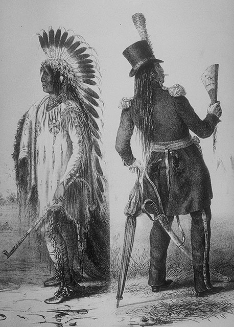 two native american indians are posing in uniform