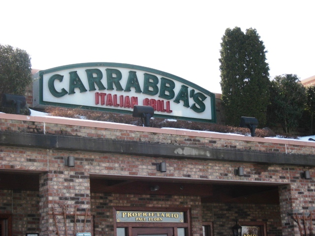 the restaurant caribas is located on a brick building