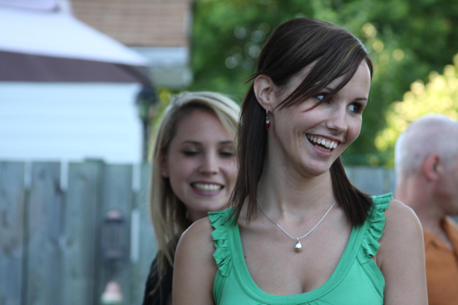 two woman are having a good time together