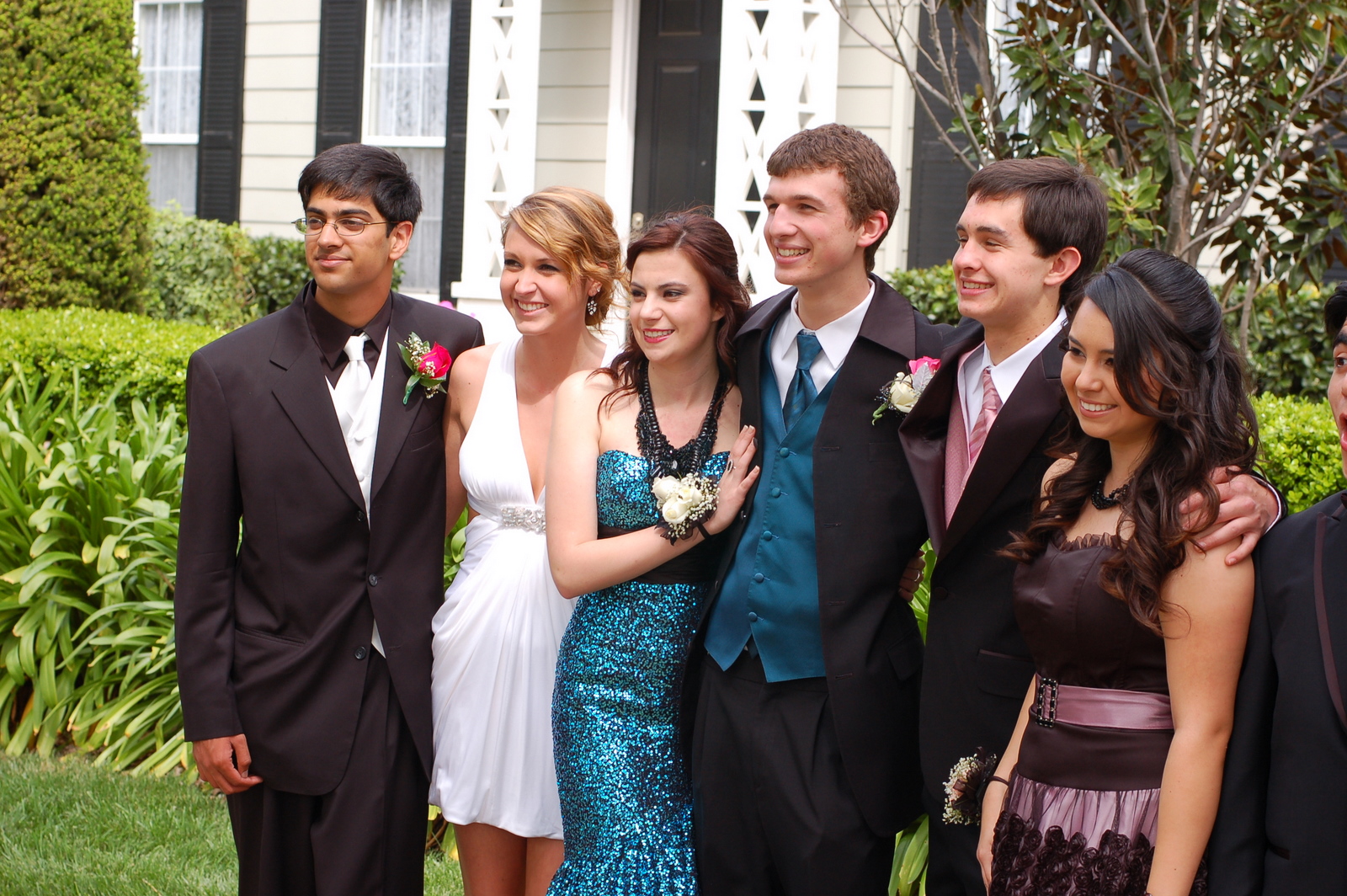 a group of young people standing next to each other