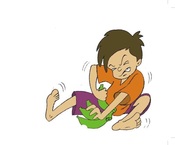 a boy in a orange shirt and purple shorts is holding a green soccer ball