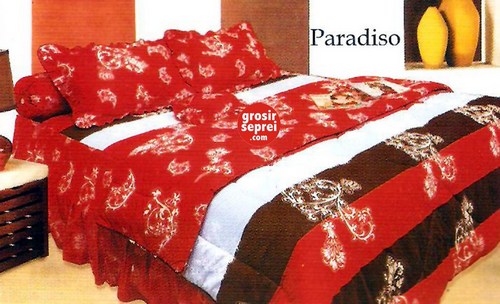 a bedroom with the color red and white has flowers