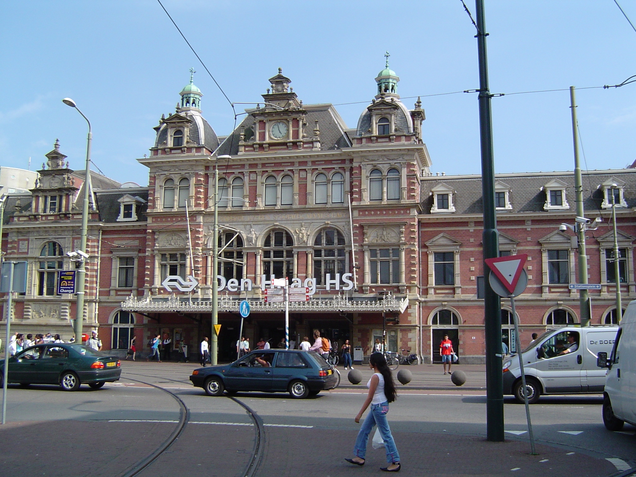 a large building sitting on the corner of a street