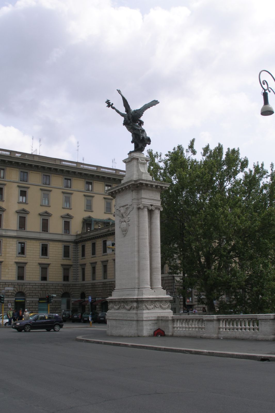 the monument has an angel on it and is located on the corner