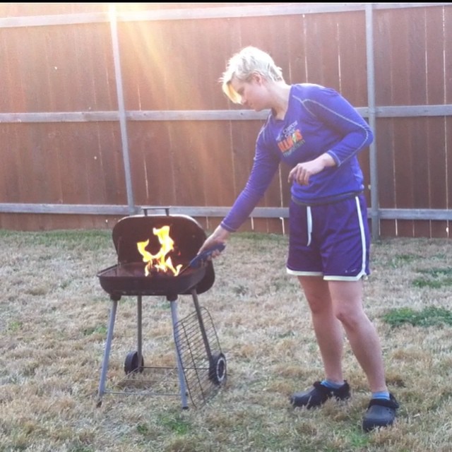 a young lady in a shorts is preparing food