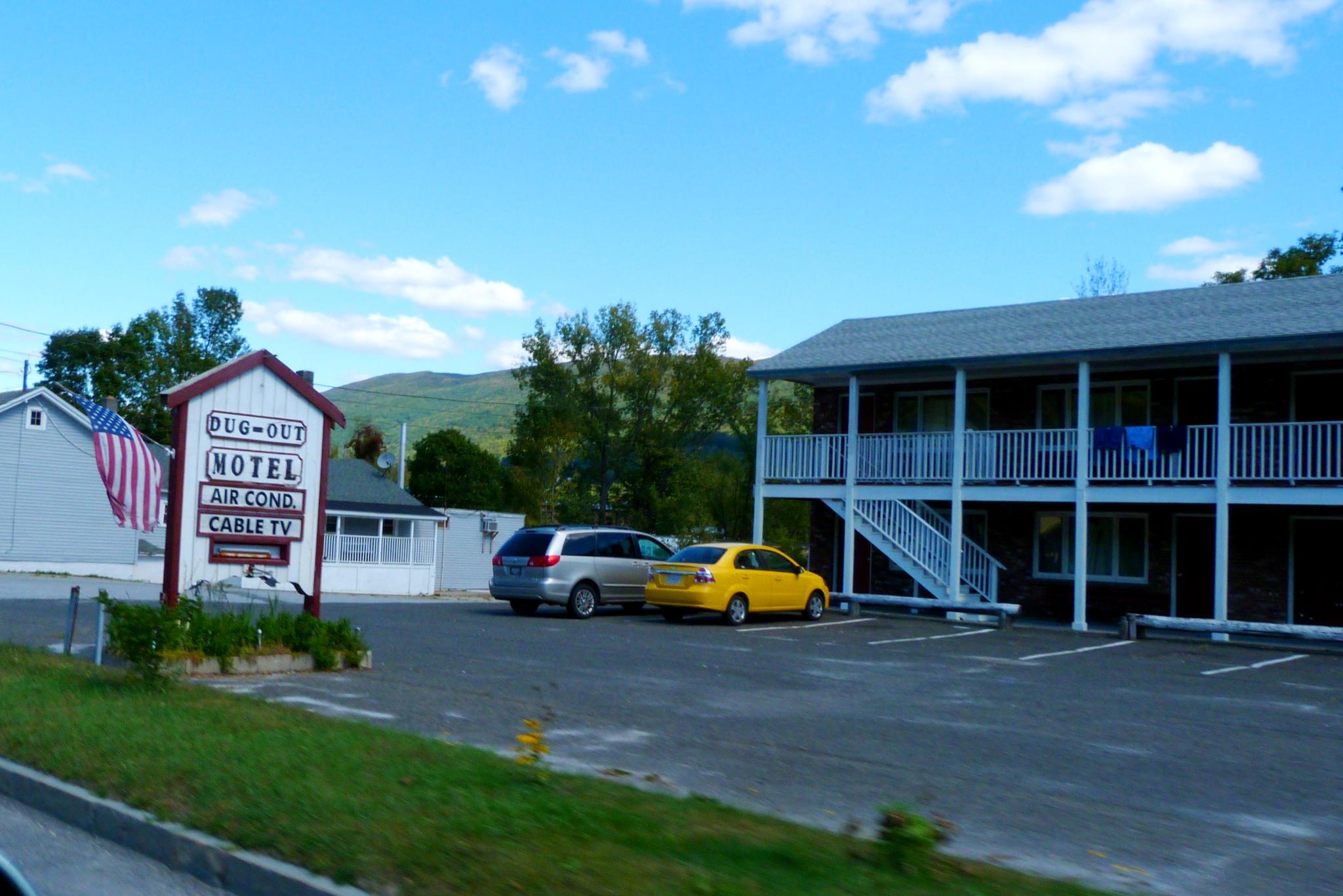 motels and cars in a motel parking lot