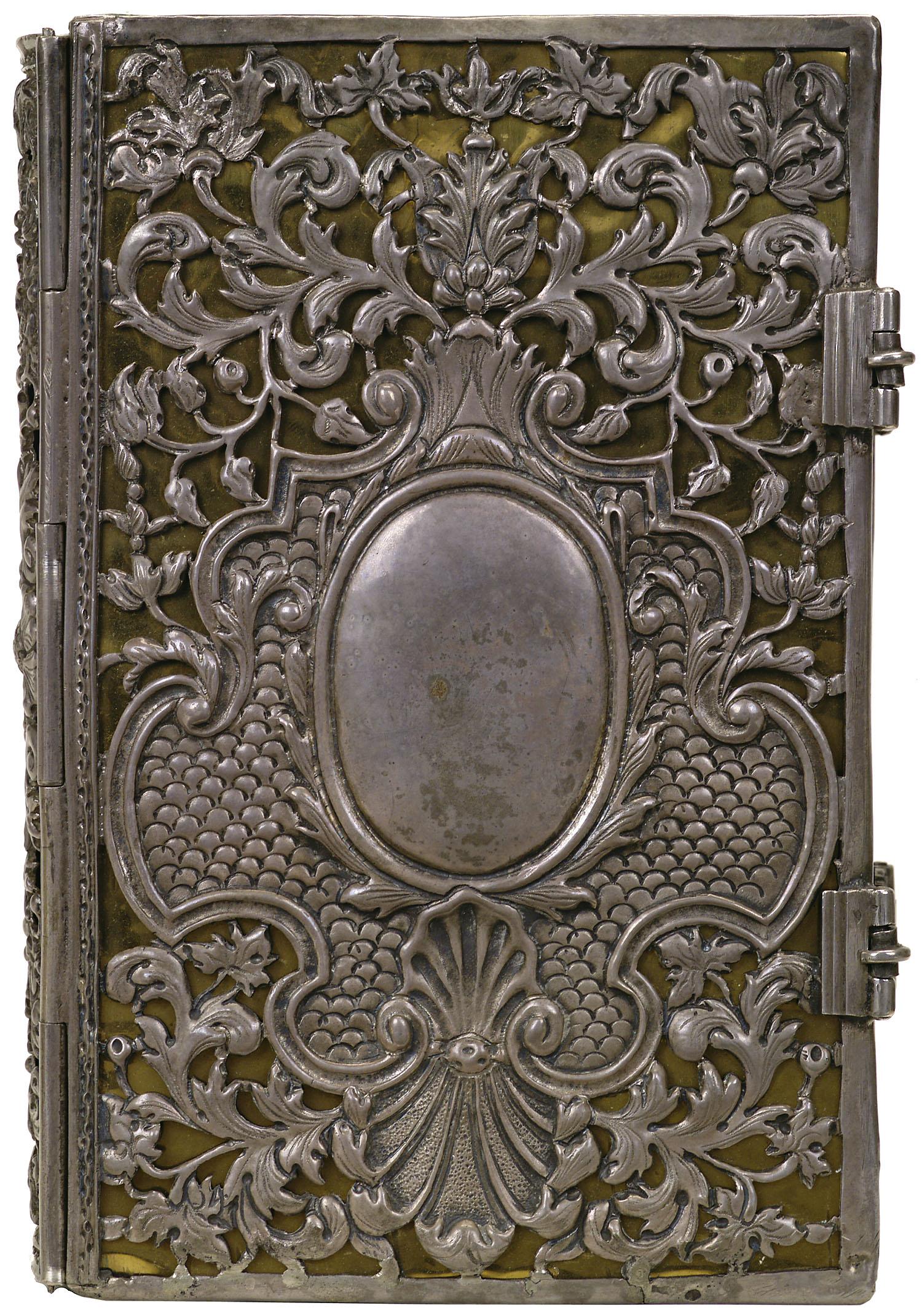 an intricately decorated book is shown with a white background