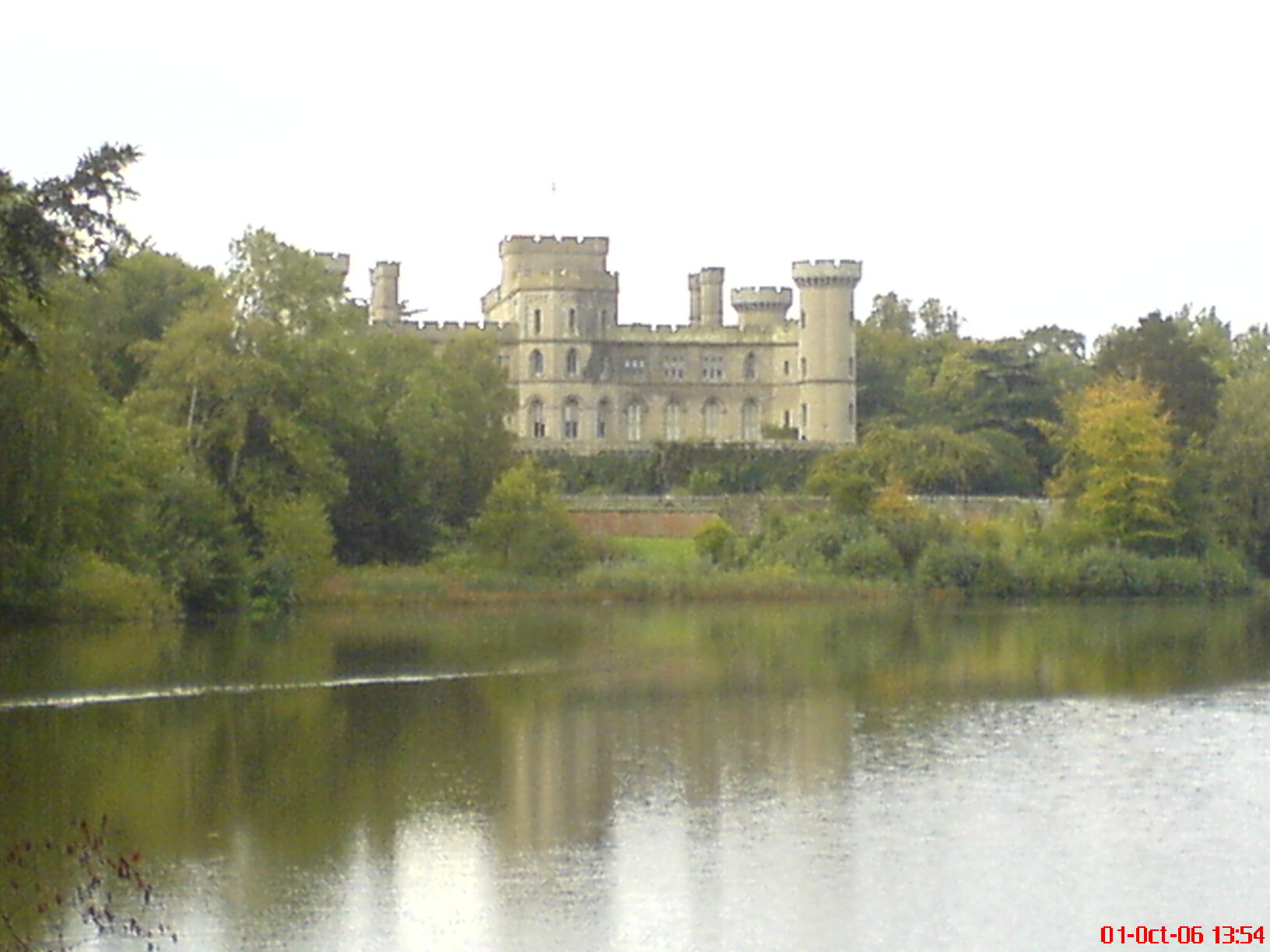a castle is seen in the distance on a calm day