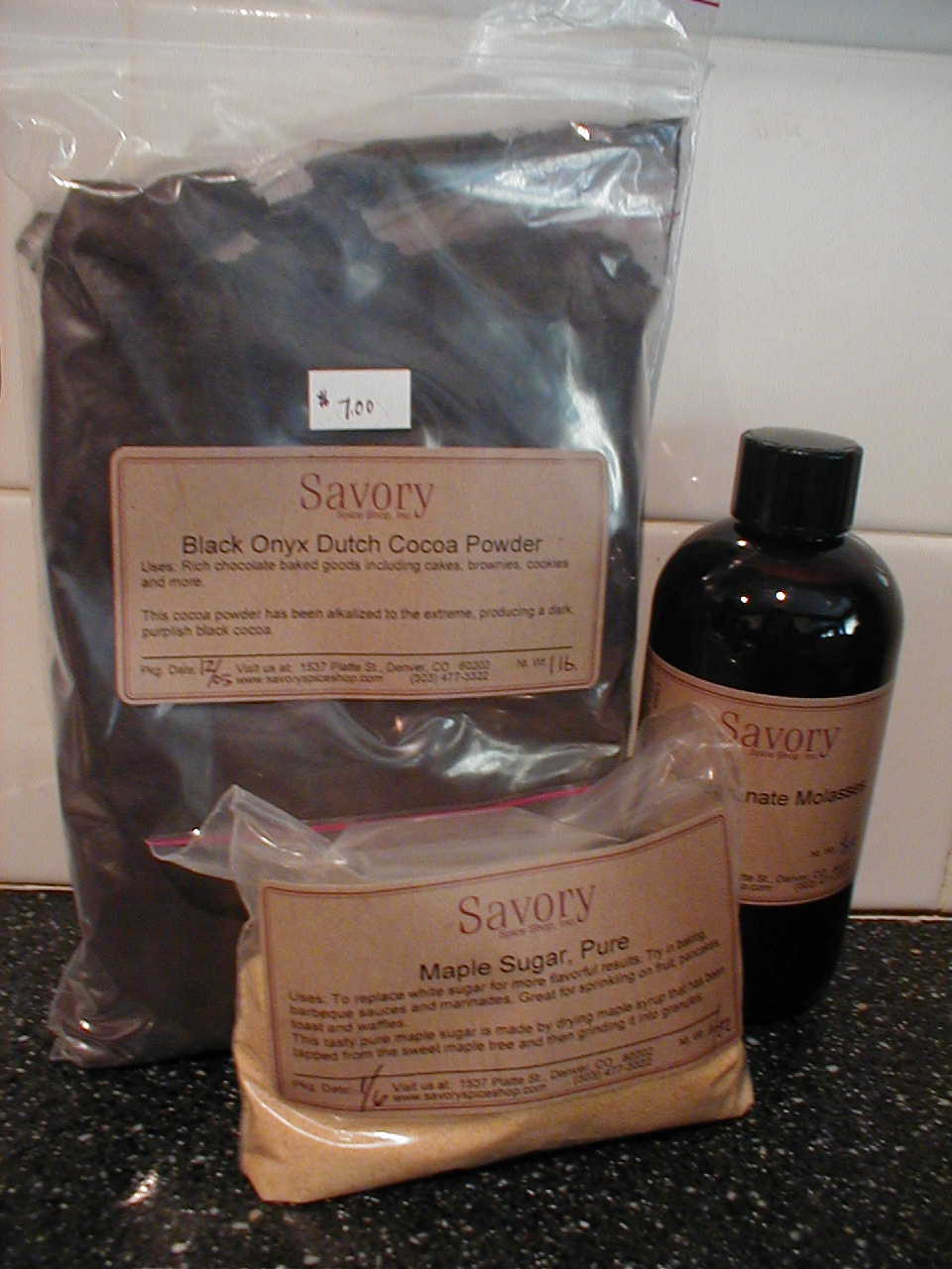 three items labeled savoy with two black bottles