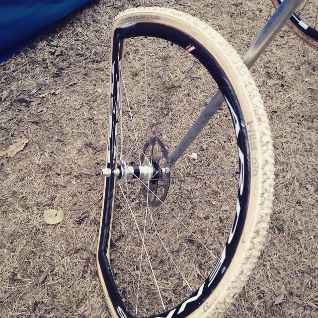 an image of a bicycle wheel in the dirt