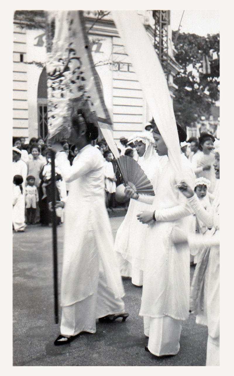 old black and white po of people dressed in white