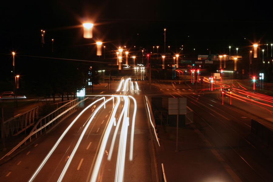 the freeway is very busy at night in the dark