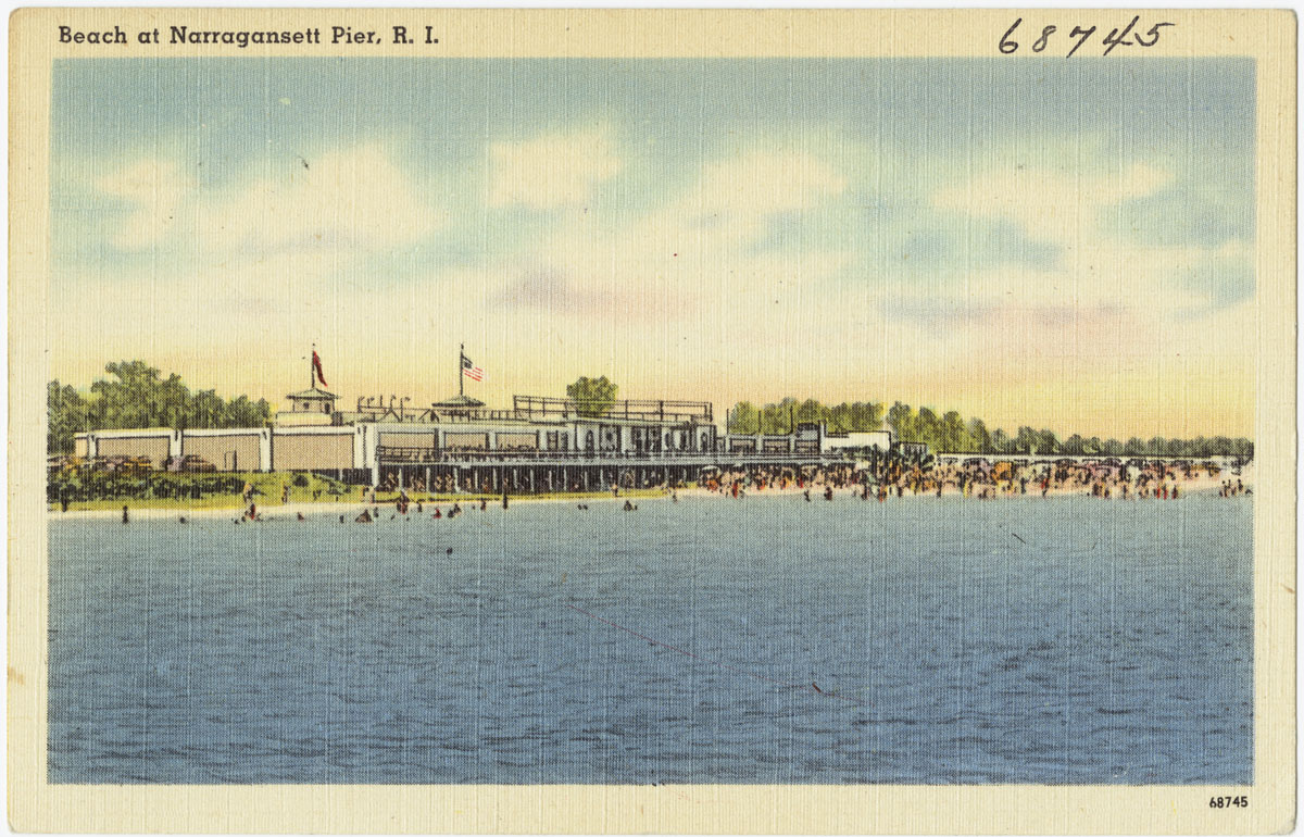 a view of the beach at montrose pier, from across the water