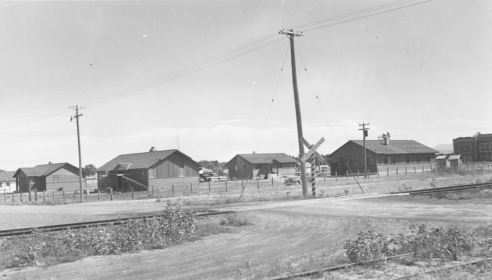 an old po of houses near the railroad tracks