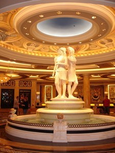 a fancy statue in front of a circular room