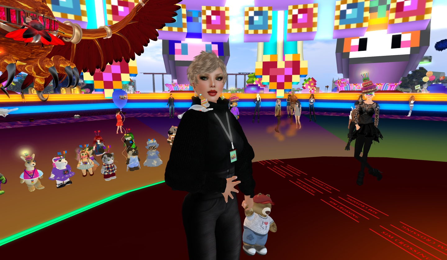 a animation woman dressed in all black standing next to an animated bird