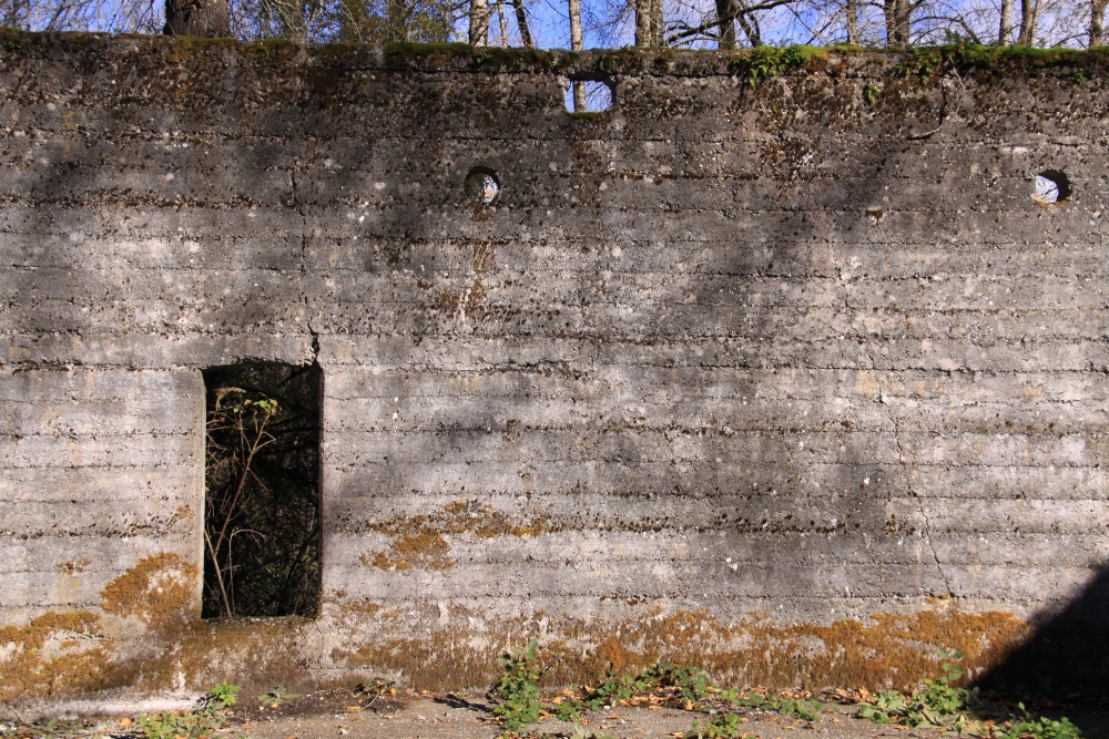 an abandoned building that has a door to the outside