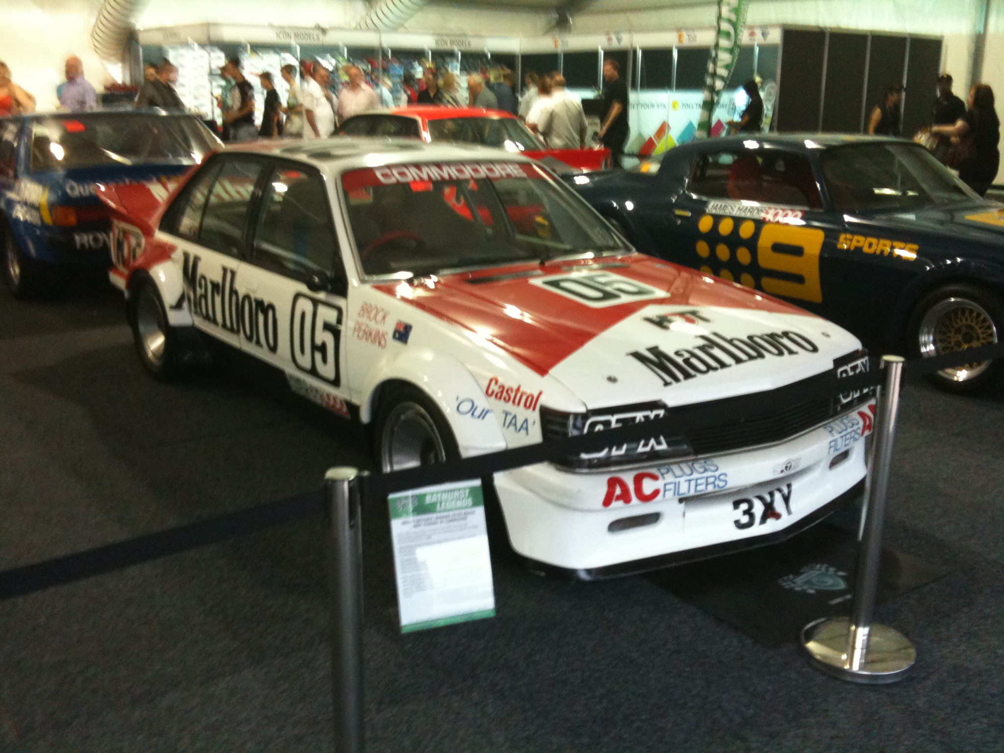 a car is parked at the exhibition booth