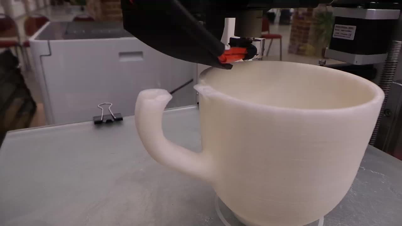 a plastic pitcher filled with white liquid