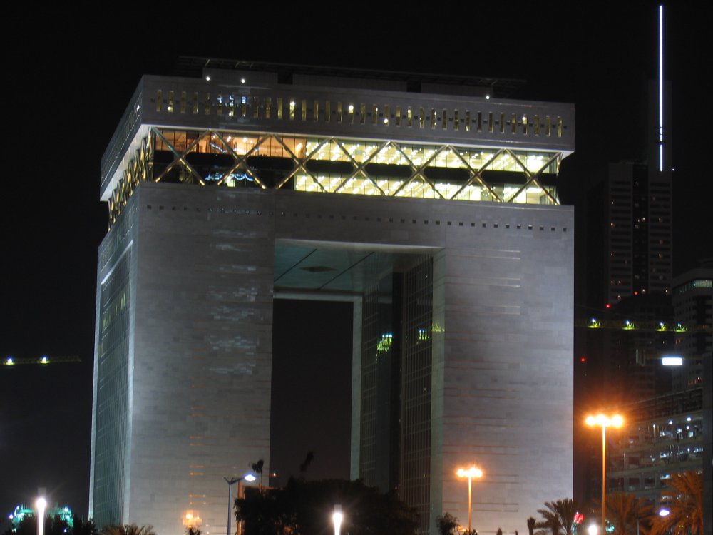 an image of a very tall building at night
