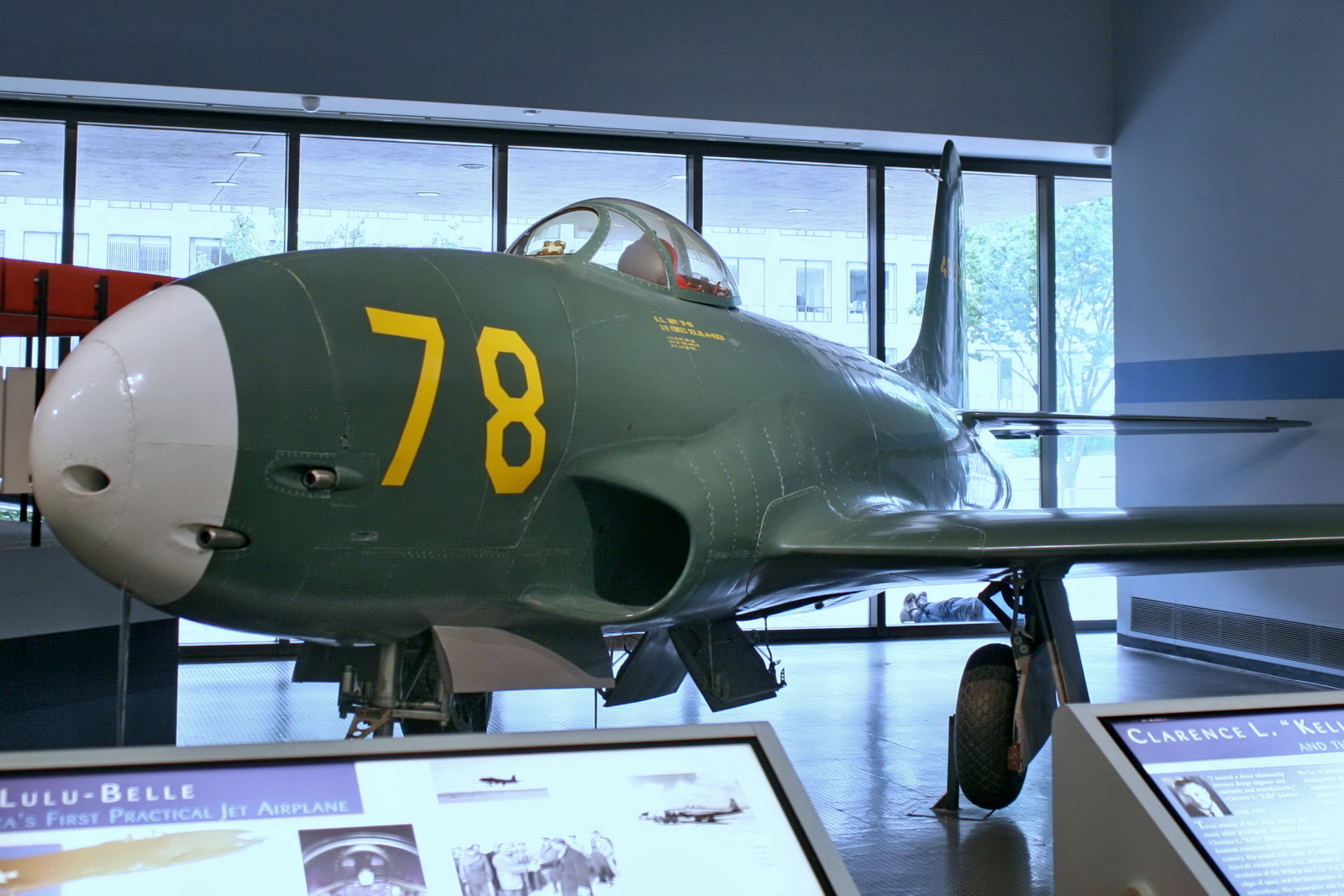 a museum display with fighter jets on display