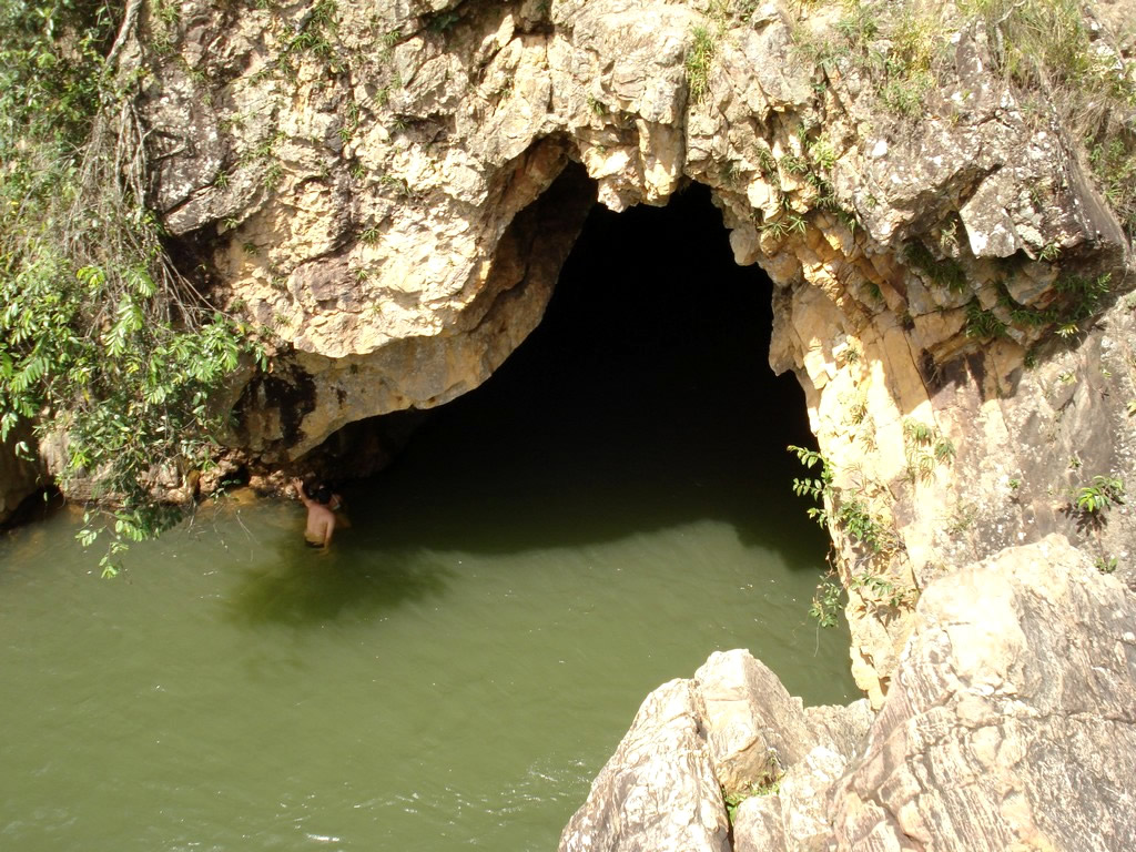 a cave that is built into the side of a cliff