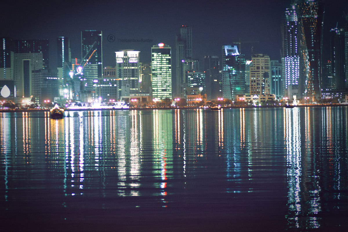 a large city sitting in the middle of a river