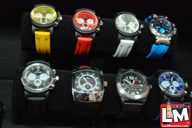 a set of eight watches with different colors