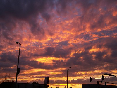 a purple and orange sunset over the sky