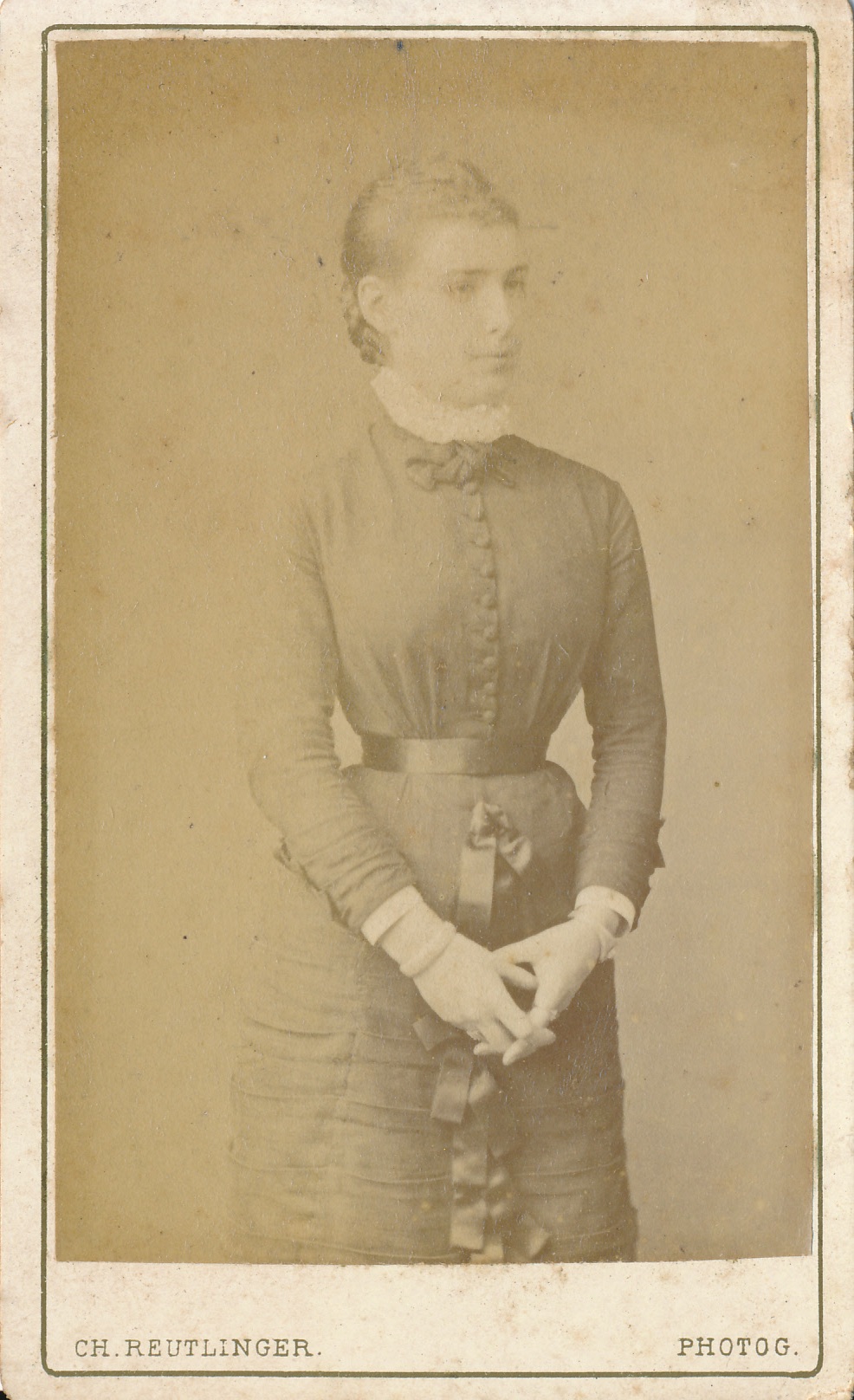 an old po of a young woman dressed in period clothing