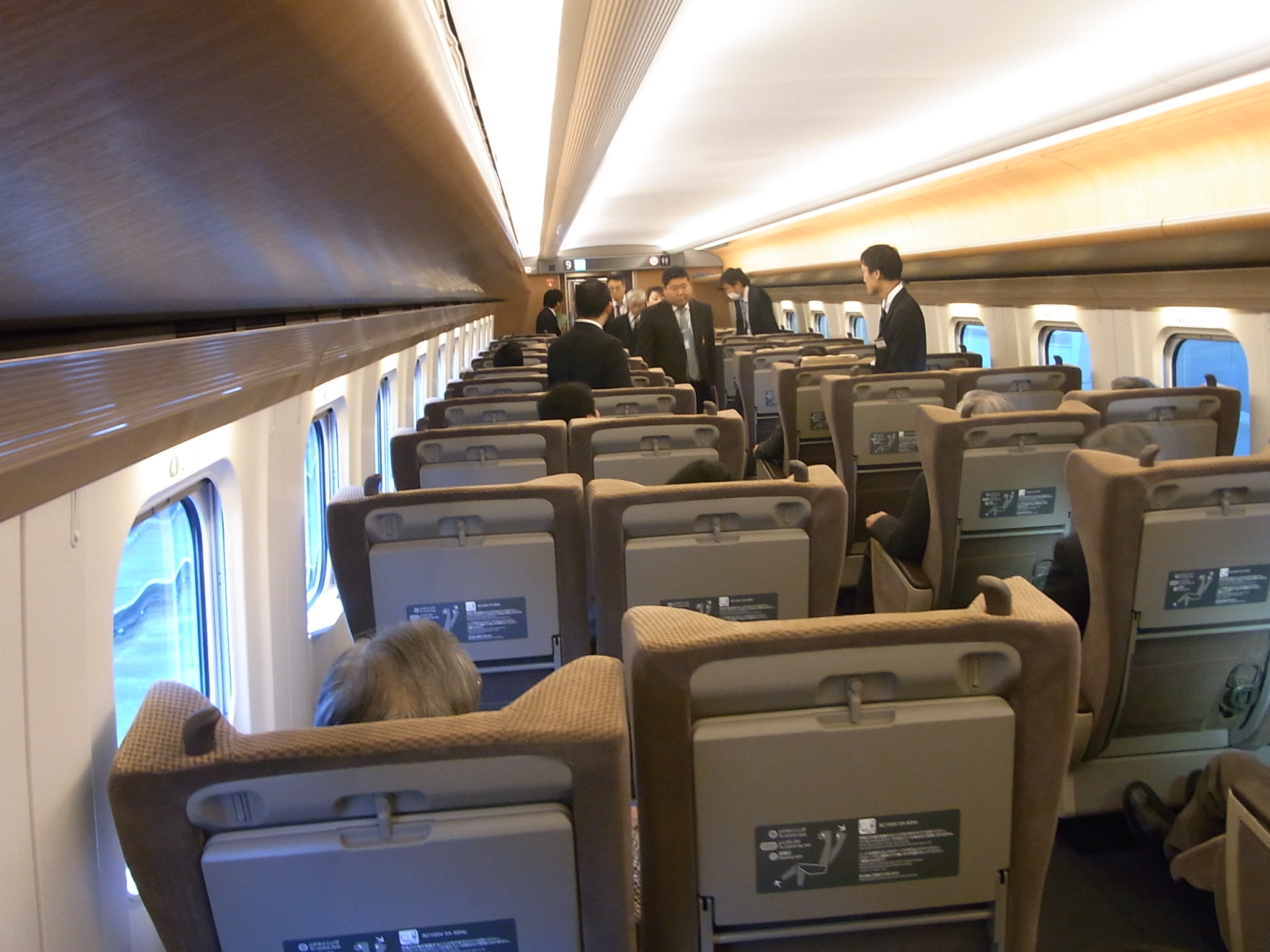 a very long plane that is filled with lots of windows