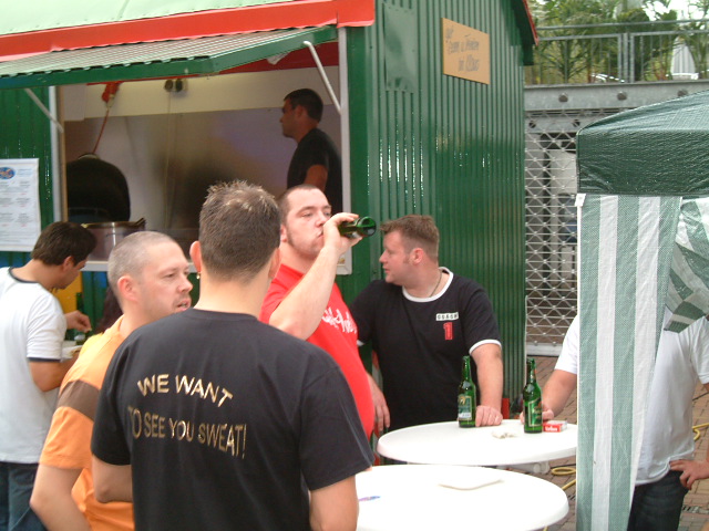 a group of people are gathered at an outdoor event