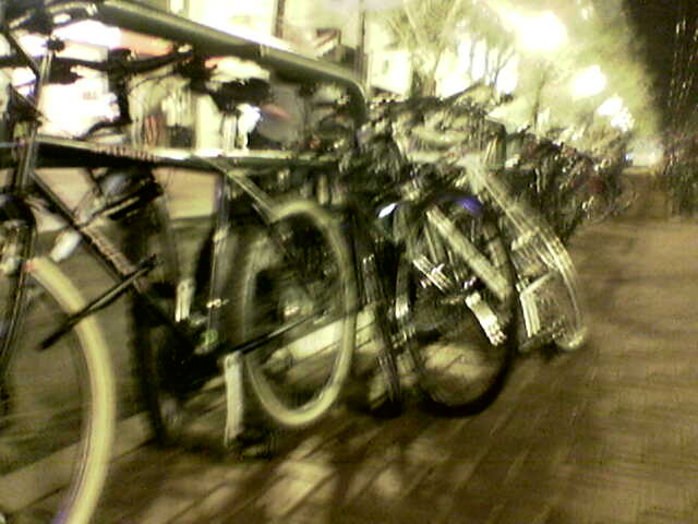 this is a picture of bikes parked in the street