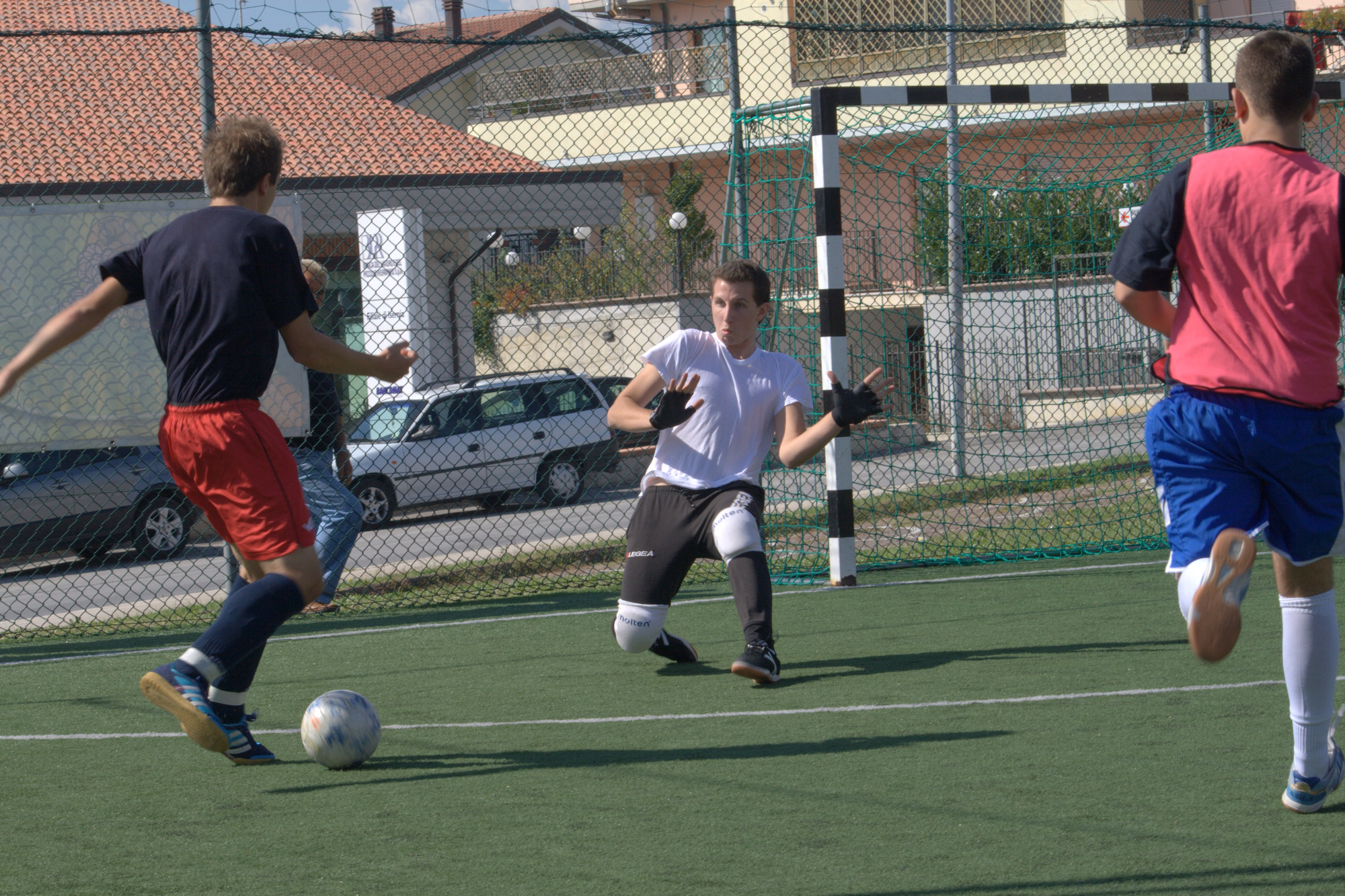 the boys are playing soccer on the field