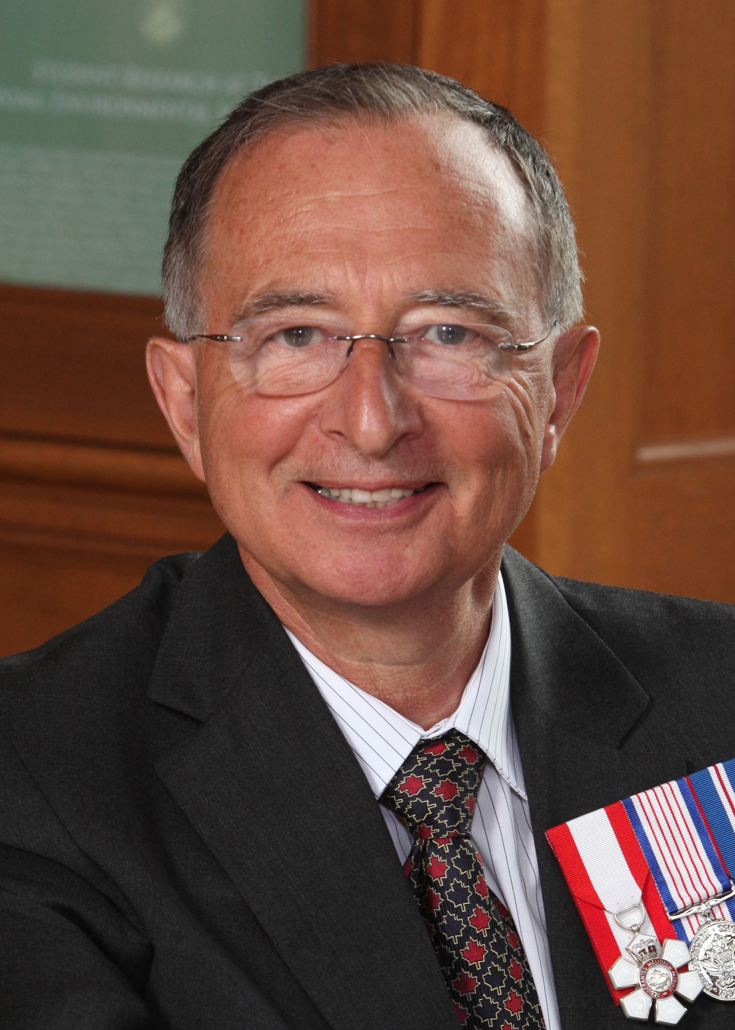 the older man has two medals on his lapel