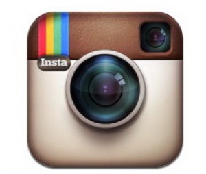 the instagram logo is shown on an iphone