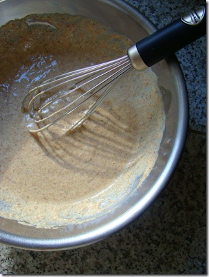 a mixing bowl with whisk inside it