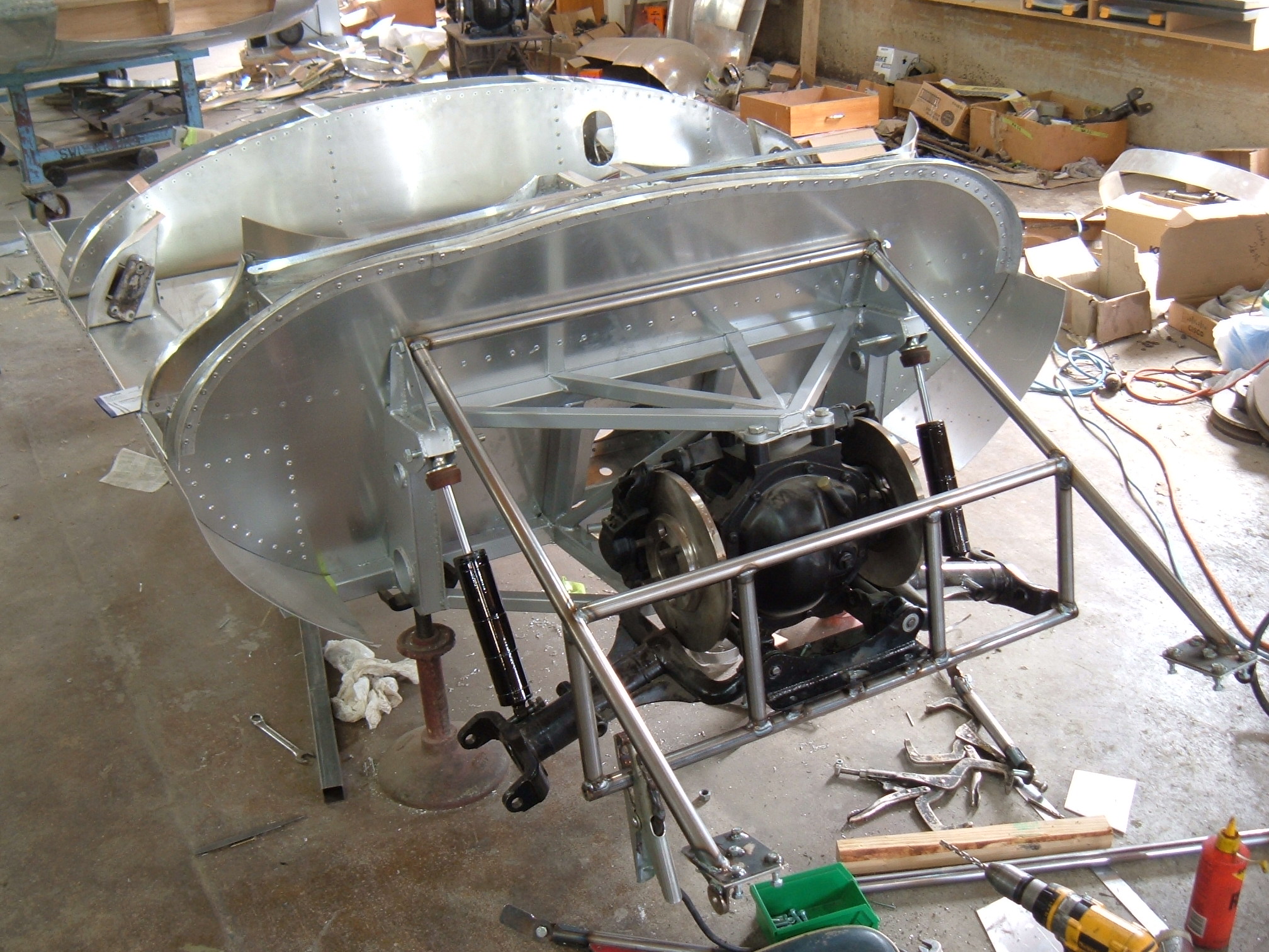 a boat being worked on in a warehouse