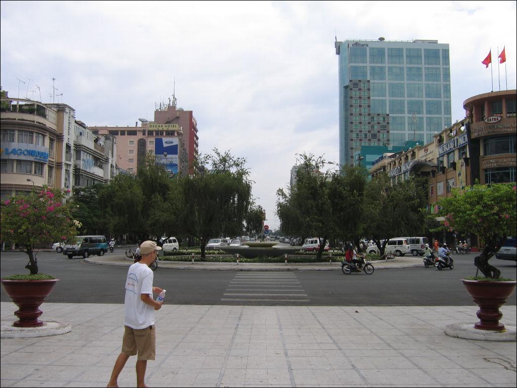 a person is walking through the city square