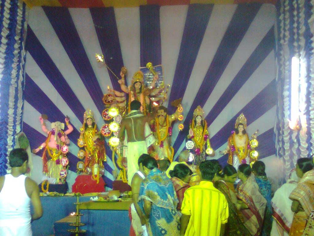 the stage is full of performers in bright outfits