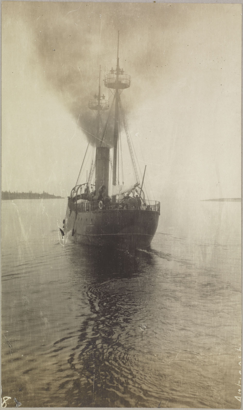 an old pograph of a boat with smoke pouring out of it