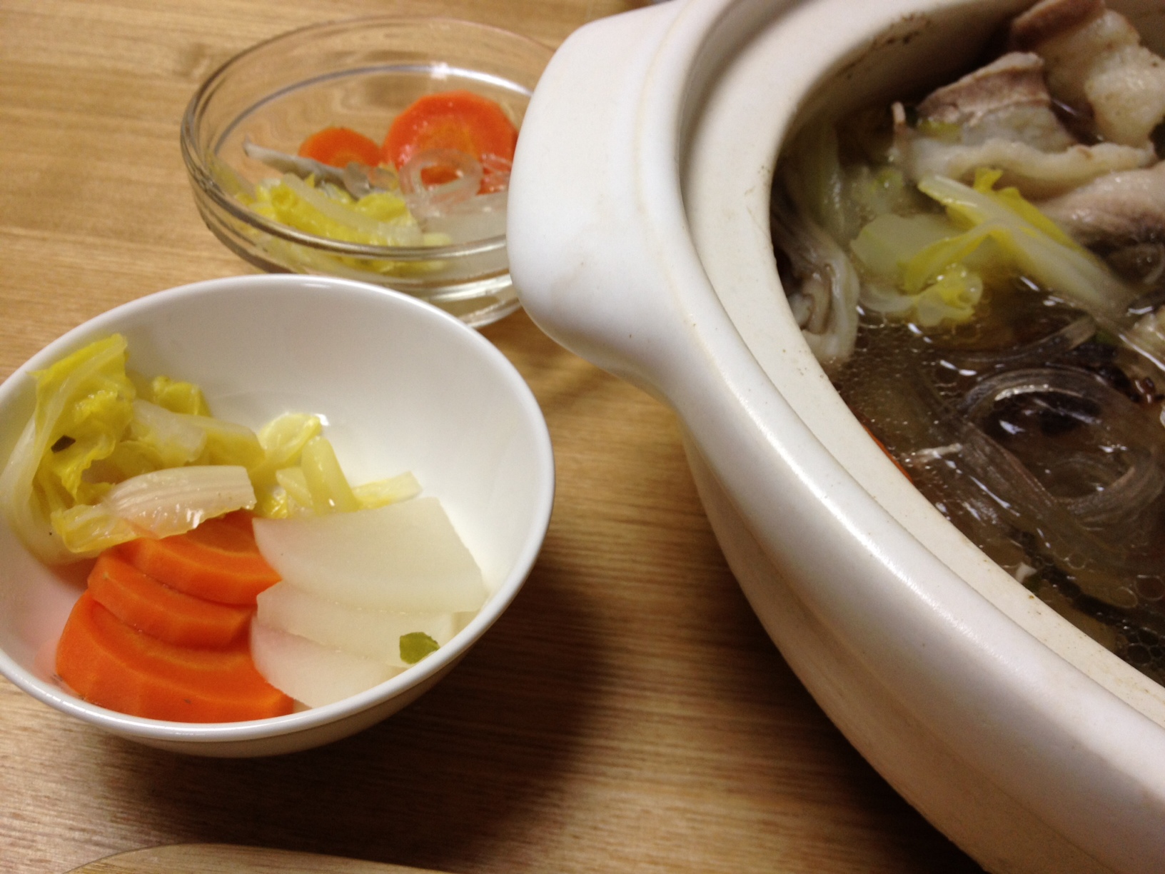 a bowl of carrots, celery and onions