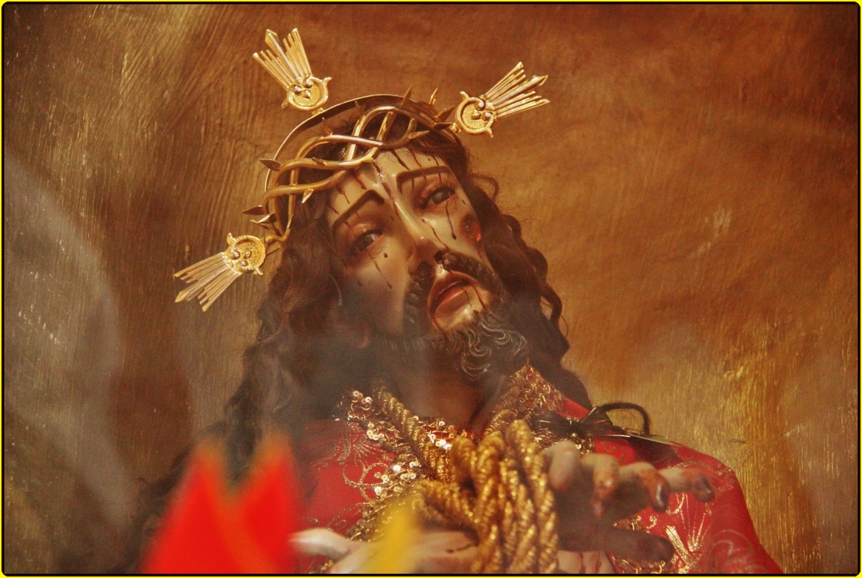 jesus christ is on the cross wearing golden crown