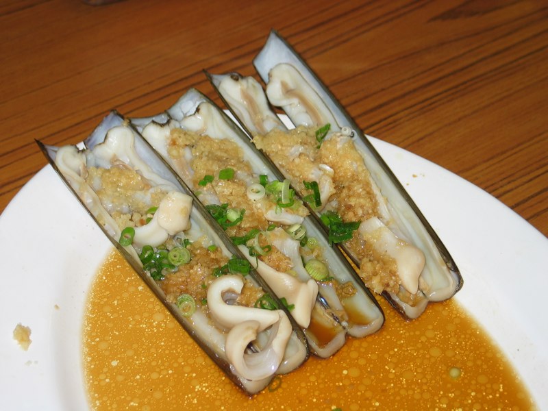 several pieces of food sitting on top of a white plate