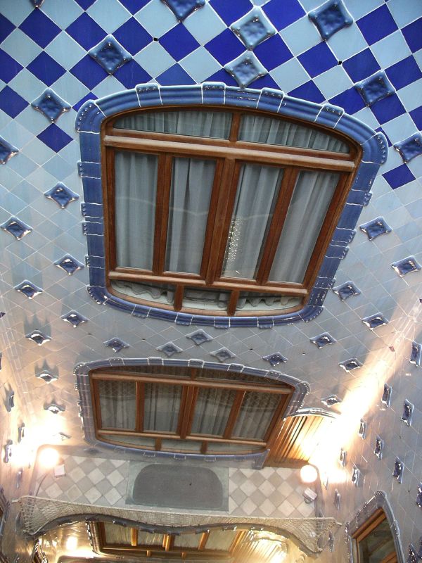 blue and white tiled ceilings with windows above