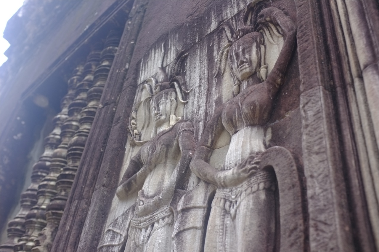 a close up of a tower with carvings