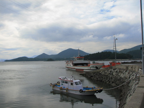 a couple of boats are out on the water