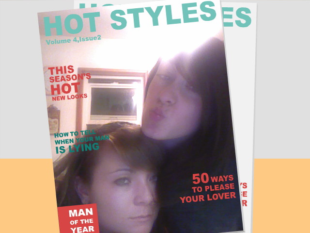 two women are standing on a magazine with an ad for their website