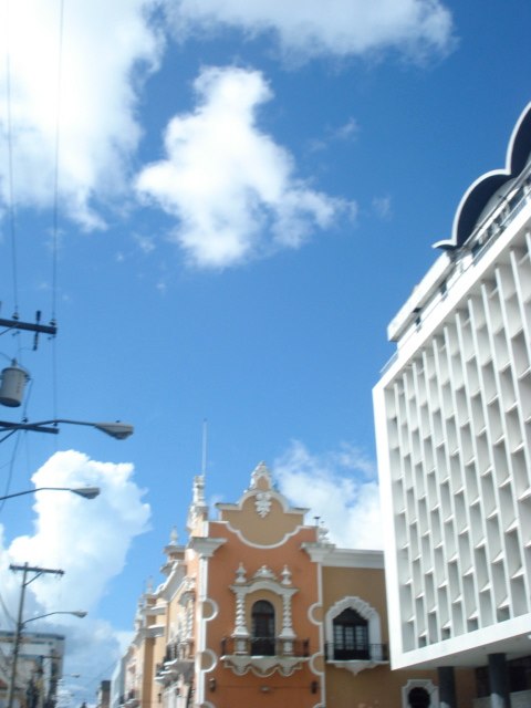 a tall church building sitting on the side of a street