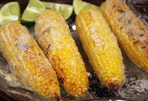 corn on the cob with lime slices and er